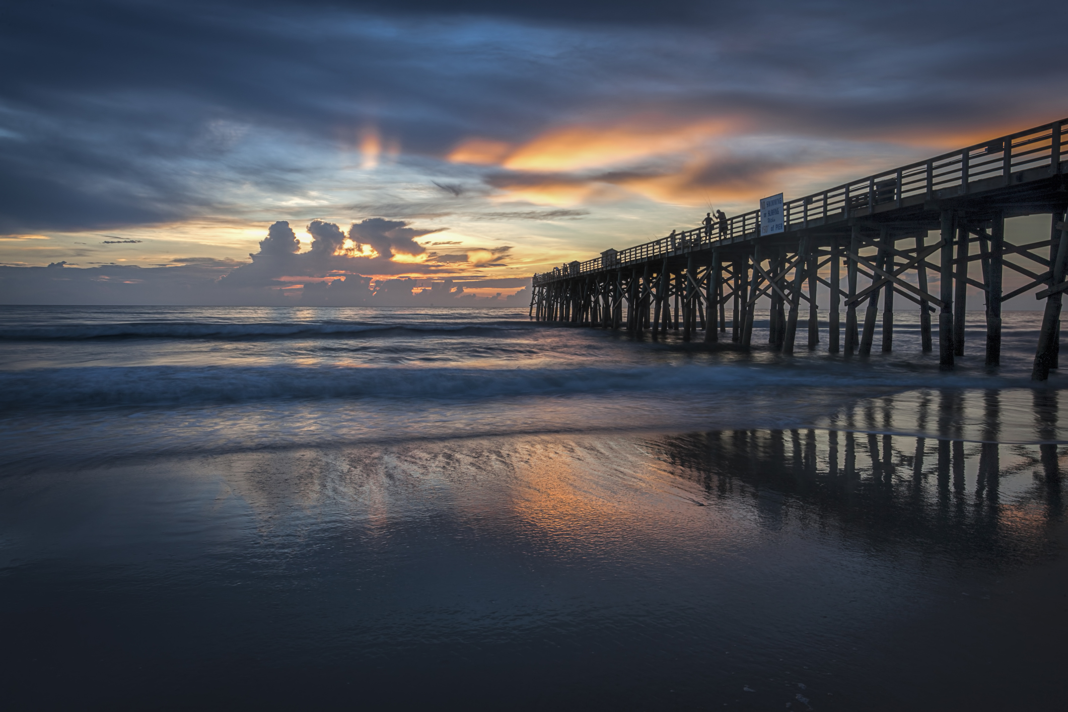 Sunrise over the Atlantic Ocean at the pier in Flagler Beach, Florida.